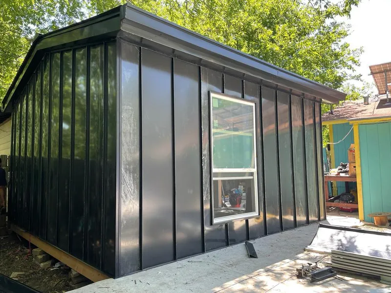 Black standing seam metal wall panels for Metal Roof Installation in Stokesdale